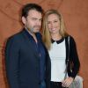 Clovis Cornillac avec sa femme à Roland Garros le 3 juin 2014