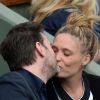 Clovis Cornillac complice avec sa femme à Roland Garros le 3 juin 2014