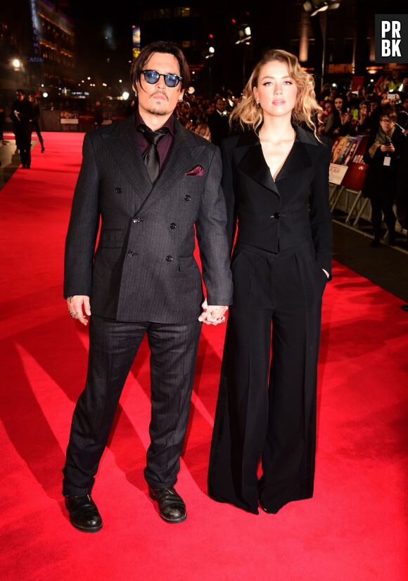 Johnny Depp et Amber Heard main dans la main à l'avant-première de Charlie Mortdecai, le 19 janvier 2015 à Londres