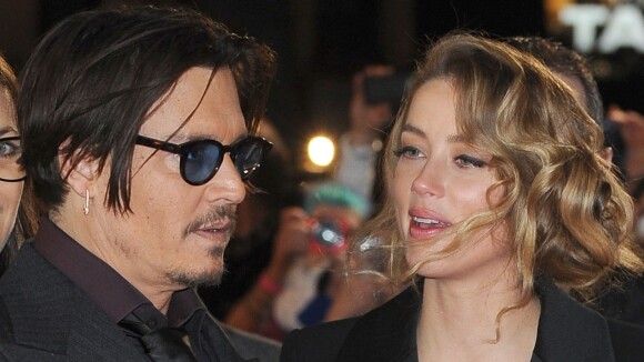Johnny Depp et Amber Heard complices sur le tapis rouge... pour démentir leur "rupture"