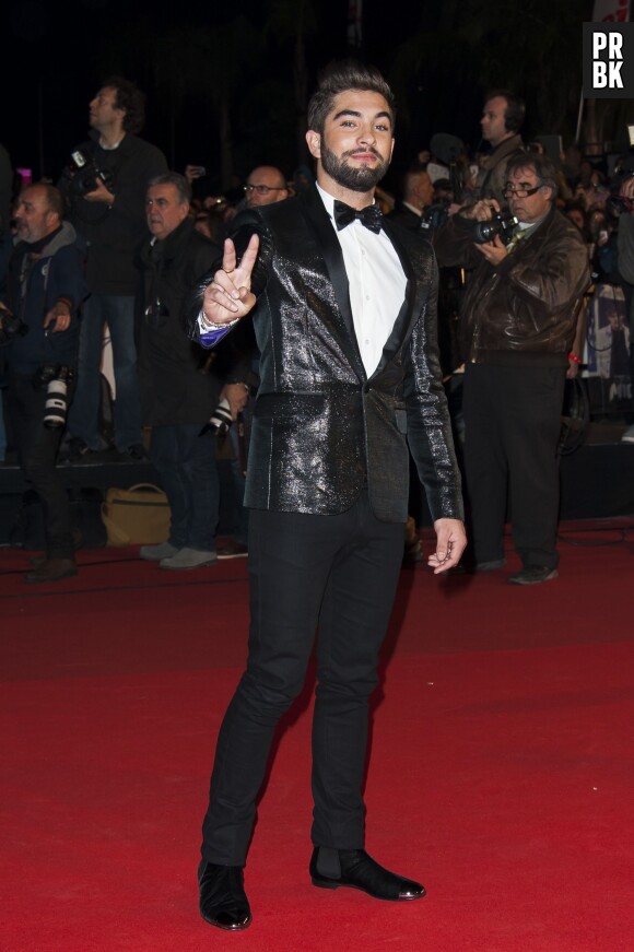 Kendji Girac classe sur le tapis rouge des NMA 2014, le 13 décembre 2014 à Cannes