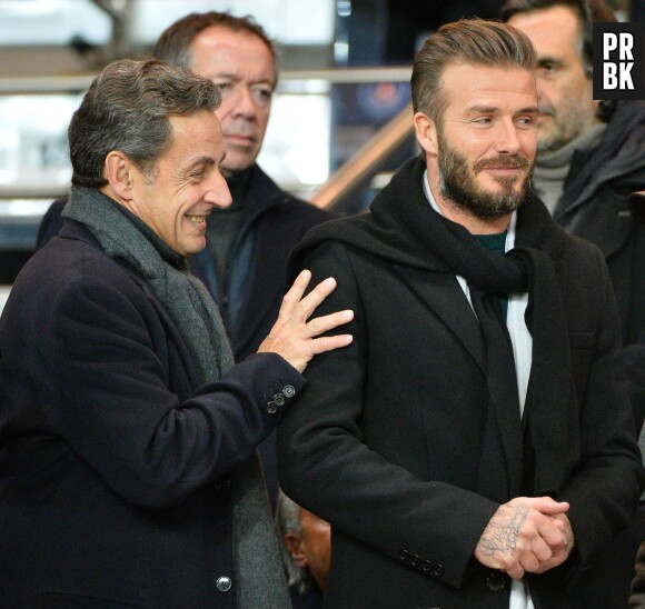 Nicolas Sarkozy et David Beckham dans les tribunes du Parc des Princes pour le match PSG-Chelsea, le 17 février 2015