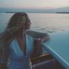 Emilie Nef Naf décolletée et sublime pour une balade en mer en Italie le 6 juin 2015