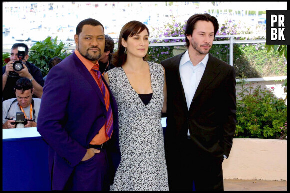 "LAWRENCE FISHBURN" "CARRIE ANN MOSS" ET "KEANU REEVES" PHOTOCALL "MATRIX RELOADED" 56EME FESTIVAL DE CANNES "PLAN SERRE" 15-05-2003 CANNES, FRANCE THE 56¡ FESTIVAL OF THE CINEMA OF CANNES IN THE PHOTO: LAWRENCE FISHBURN, CARRIE ANN MOSS AND KEANU REEVES 