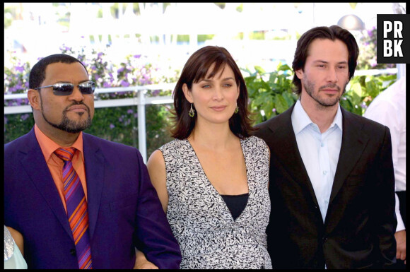 "LAWRENCE FISHBURN" "CARRIE ANN MOSS" ET "KEANU REEVES" PHOTOCALL "MATRIX RELOADED" 56EME FESTIVAL DE CANNES "PLAN SERRE" 15-05-2003 CANNES, FRANCE THE 56¡ FESTIVAL OF THE CINEMA OF CANNES IN THE PHOTO: LAWRENCE FISHBURN, CARRIE ANN MOSS AND KEANU REEVES 