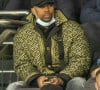 Il s'exprime sur de nombreux sujets.
Rohff en tribune lors du match de ligue des champions (Champions League) PSG (Paris Saint Germain) conte Bruges 4-1 au Parc des Princes à Paris le 7 décembre 2021.