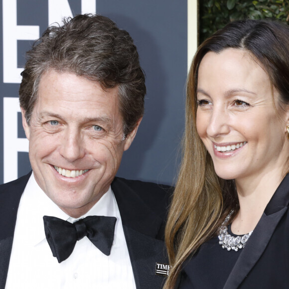 Se retirer des romances après vingt ans de classiques ? Un départ façon star du foot, mais qui s'explique par des raisons très personnelles. Et surtout, très subjectives ! On écoute Hugh Grant : "Je suis devenu trop vieux, trop gros et trop laid pour faire des comédies romantiques, évidemment". A d'autres !
Info - Hugh Grant fête ses 60 ans le 9 septembre - Hugh Grant et sa compagne Anna Eberstein enceinte sur le tapis rouge de la 75ème cérémonie des Golden Globe Awards au Beverly Hilton à Los Angeles, le 7 janvier 2018. 