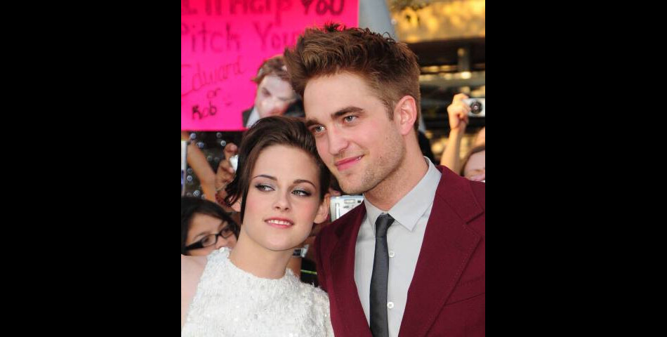 Robert Pattinson et Kristen Stewart lors de la promo de Twilight 3