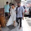Kim Kardashian et Kanye West bien chics pour visiter Rio.
