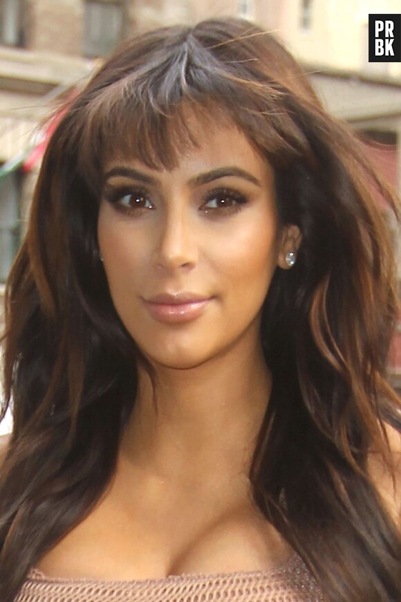 Kim Kardashian n'a bizarrement rien pris dans le visage, à New-York le 26 mars 2013