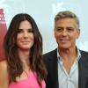 Sandra Bullock et George Clooney prennent la pose à la Mostra de Venise le 28 août.