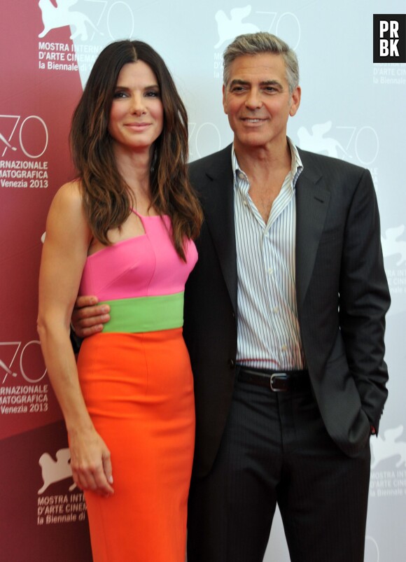 Sandra Bullock et George Clooney prennent la pose à la Mostra de Venise le 28 août.