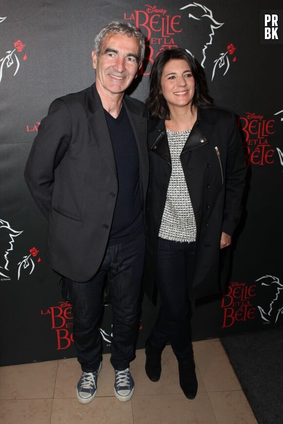 Estelle Denis et Raymond Domenech à l'avant-première de La Belle et La Bête avec Vincent Niclo, le 20 mars 2014 à Paris