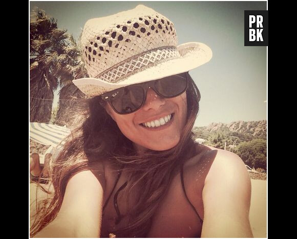 Karine Ferri pendant ses vacances au soleil en juillet 2014