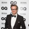 Colin Firth et son prix aux GQ Men of the Year Awards le 2 septembre 2014 à Londres