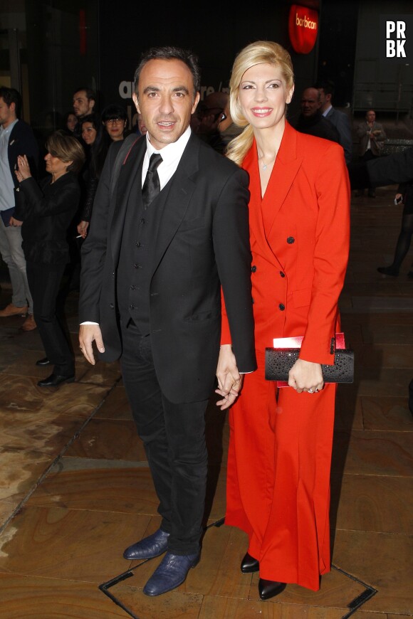 Nikos Aliagas et sa compagne Tina Grigoriou à l'exposition The Fashion World of Jean-Paul Gaultier, le 7 avril 2014 à Londres