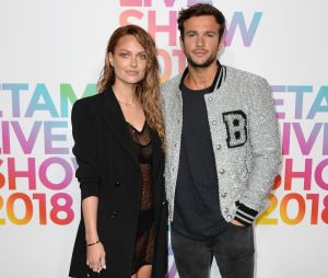 Caroline Receveur et Hugo Philip au défilé Etam, ce mardi 25 septembre 2018 à Paris.