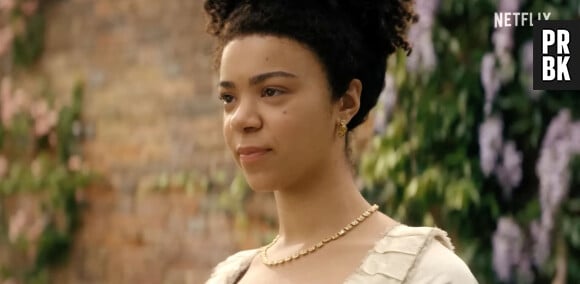 Les images de la bande-annonce de la série "Queen Charlotte : A Bridgerton Story".  Queen Charlotte proves to be a hands-on monarch in sensual new Bridgerton spin-off teaser trailer. Dear readers - and Queen Charlotte fans - now is the time to rejoice. Netflix has unveiled a new look at the Bridgerton origin series Queen Charlotte: A Bridgerton Story, featuring India Amarteifio in the lead role first helmed by Golda Rosheuvel on the preceding series. In the first teaser, a young Charlotte meets her future husband King George III. And while love is very much in the air, it's not without its struggle. "Your marriage is the business of this country," a character in the clip says. "This cannot go wrong." And it's not just love that's at stake - given that Charlotte is ‘the first of her kind’ in the position she's in, she's advised to ‘secure’ her role. "This is my home," Charlotte says. "I am the queen." The series will dive into Queen Charlotte's youth and love life. Now played by Amarteifio, young Charlotte ends up marrying King George III (Corey Mylchreest), cementing her position at the top of the Bridgerton universe. The prequel also stars Michelle Fairley as Princess Augusta, Sam Clemmett as Young Brimsley (with Hugh Sachs as adult Brimsley), Richard Cunningham as Lord Bute, Tunji Kasim as Adolphus, Rob Maloney as the Royal Doctor and Cyril Nri as Lord Danbury. "Many viewers had never known the story of Queen Charlotte before Bridgerton brought her to the world, and I'm thrilled this new series will further expand her story and the world of Bridgerton," Netflix's Head of Global TV, Bela Bajaria, said in a statement. Shonda Rhimes and her team are thoughtfully building out the Bridgerton universe so they can keep delivering for the fans with the same quality and style they love. And by planning and prepping all the upcoming seasons now, we also hope to keep up a pace that will keep even the most insatiable viewers totally fulfilled." Queen Charlotte: A Bridgerton Story is set to premiere May 4, 2023, on Netflix. 