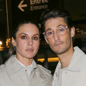 Natasha Andrews et son compagnon Pierre Niney - Arrivées au défilé de mode Hommes "AMI" prêt-à-porter automne-hiver 2023/2024 lors de la fashion week de Paris. Le 19 janvier 2023 © Veeren-Christophe Clovis / Bestimage 