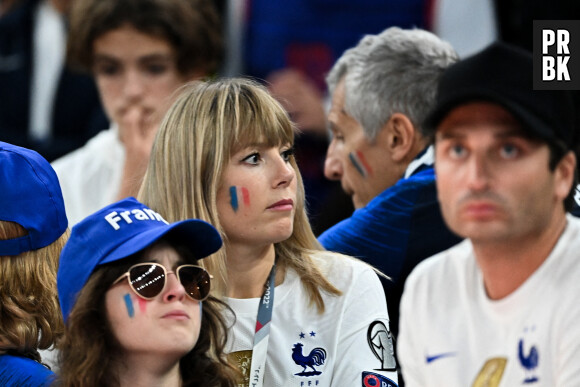 Mélanie Page, Nagui dans les tribunes du match "France - Argentine (3-3 - tab 2-4)" en finale de la Coupe du Monde 2022 au Qatar, le 18 décembre 2022. © Philippe Perusseau / Bestimage 
