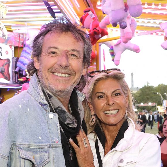 Semi-exclusif - Jean-Luc Reichmann et Caroline Margeridon lors de l'ouverture de la Fête à Neuneu 2023, la fête foraine du bois de boulogne célèbre ses 40 ans, à Paris, France, le 1er septembre 2023. © Cédric Perrin/Bestimage
