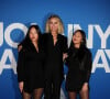 Laeticia Hallyday et ses filles Joy et Jade - Photocall du vernissage de l'exposition "Johnny Hallyday, l'exposition" au Palais des Expositions à Paris. Le 21 décembre 2023 © Dominique Jacovides / Bestimage