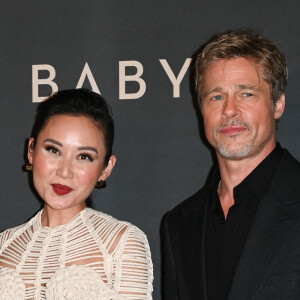 Li Jun Li et Brad Pitt à la première du film "Babylon" au cinéma Le Grand Rex à Paris. © Coadic Guirec/Bestimage 