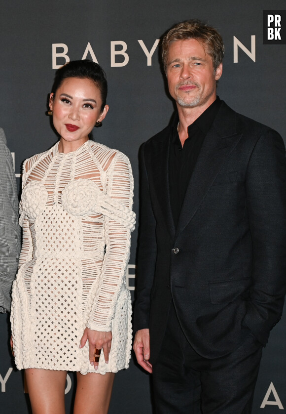 Li Jun Li et Brad Pitt à la première du film "Babylon" au cinéma Le Grand Rex à Paris. © Coadic Guirec/Bestimage 