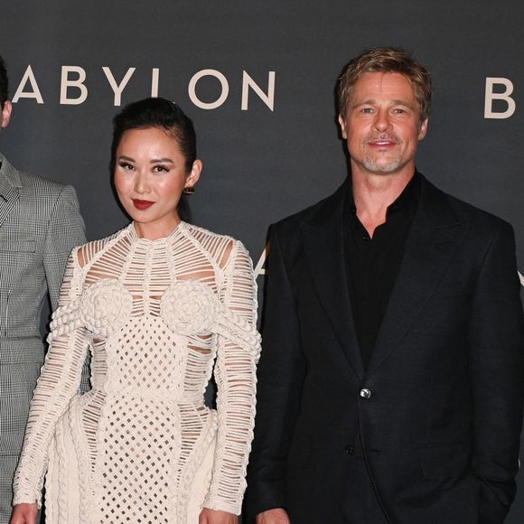 Matthew Plouffe, Olivia Hamilton, Jovan Adepo, Damien Chazelle, Li Jun Li et Brad Pitt à la première du film "Babylon" au cinéma Le Grand Rex à Paris, France, le 14 janvier 2023. © Coadic Guirec/Bestimage