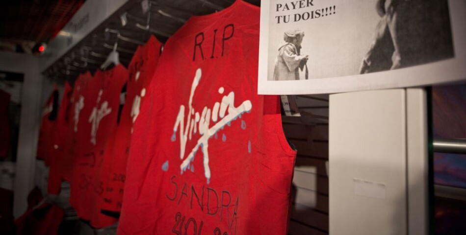 Virgin Megastore : des salariés ont occupé la boutique des Champs-Elysées en réponse à la menace de liquidation judiciaire, officiellement prononcée le 17 juin 2013