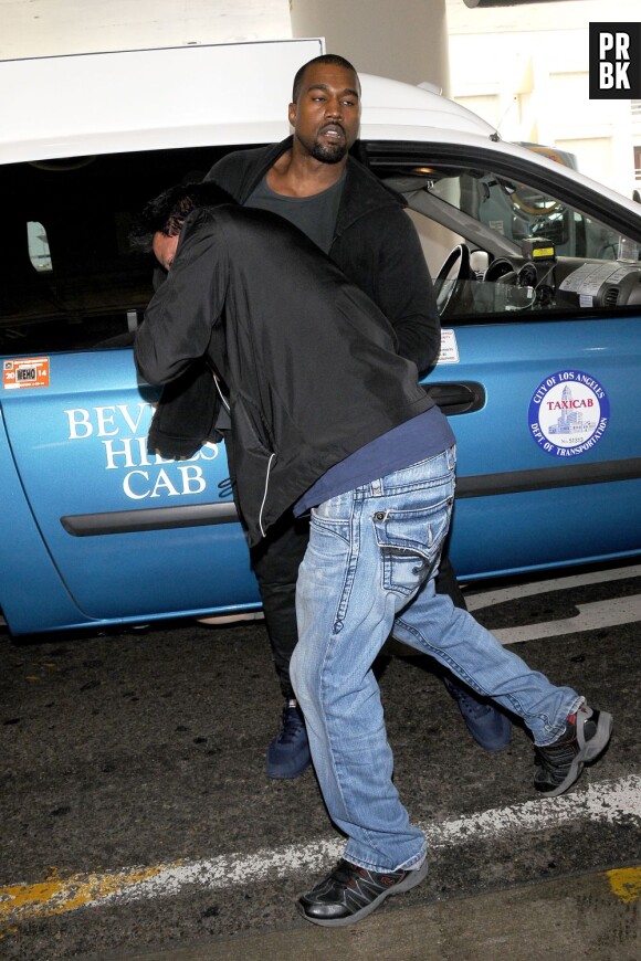 Kanye West s'en prend à un photographe le vendredi 19 juillet 2013
