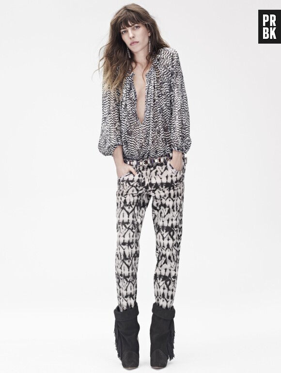 Isabel Marant pour H&M : Lou Doillon porte une blouse imprimée (79,95€), un jean tie-dye (79,95€) et des boots frangés en cuir (199€)