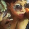 Rihanna s'exhibe avec un Loris lent en Thaïlande, au mois de septembre 2013