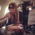 Lindsay Lohan en avion et robe très courte