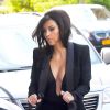 Kim Kardashian exhibe sa poitrine pendant une balade avec North, le 16 juin à NY