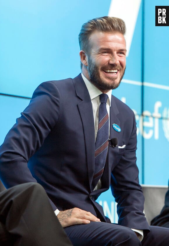 David Beckham souriant pour le lancement de son nouveau projet caritatif "7" avec l'UNICEF, le 9 février 2015 à Londres