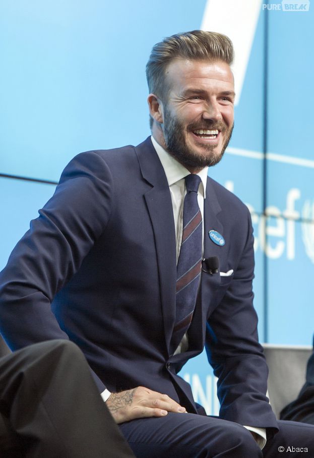 David Beckham souriant pour le lancement de son nouveau projet caritatif "7" avec l'UNICEF, le 9 f&eacute;vrier 2015 &agrave; Londres