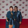 Black M et sa femme sur le tapis rouge des NRJ Music Awards 2015, le 7 novembre 2015, à Cannes