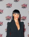 Shy'm sexy et décolletée sur le tapis rouge des NRJ Music Awards 2015, le 7 novembre 2015, à Cannes