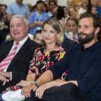 Jamie Dornan avec son père Jim Dornan et sa soeur Jessica Dornan à un événement de charité contre le cancer