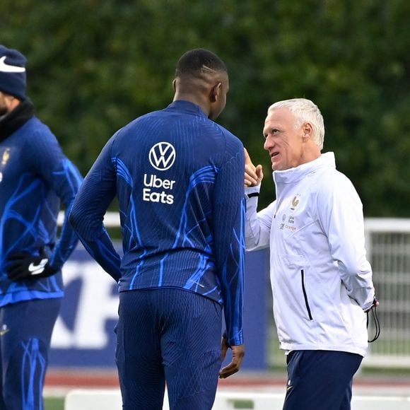 Konate Ibrahima ( France ) - Didier Deschamps ( selectionneur - entraineur - France ) - Entraînement de l'équipe de France de football pour le match de qualification à l'Euro 2024 contre les Pays-Bas au centre de formation et centre National du Footbal de Clairefontaine-en-Yvelines, France, le 20 mars 2023. © Federico Pestellini/Panoramic/Bestimage  Training of the French football team for the Euro 2024 qualifying match against the Netherlands at the training center and National Footbal Center in Clairefontaine-en-Yvelines, France, on March 20, 2023.