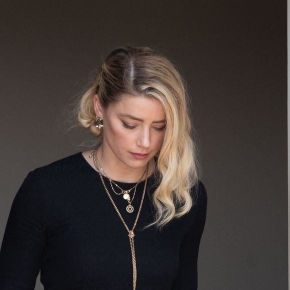 Amber Heard à la sortie du tribunal de Fairfax. Amber Heard a été condamné à verser à J. Depp, 8 millions de dollars pour diffamation. Fairfax, le 1er juin 2022.  Amber Heard departs the Fairfax County Courthouse, in Fairfax, Virginia, after the verdict was announced in the civil trial with Johnny Depp, Wednesday, June 1, 2022. Depp brought a defamation lawsuit against his former wife, actress Amber Heard, after she wrote an op-ed in The Washington Post in 2018 that, without naming Depp, accused him of domestic abuse. 