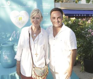 Chantal Ladesou, Laurent Amar lors d'un tournoi de pétanque place des Lices organisé par le magazine Turquoise pour l'association Sourire à la vie à Saint-Tropez le 10 août 2022. © Jack Tribeca / Bestimage