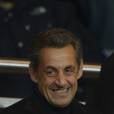 Nicolas Sarkozy grand sourire malgré sa mise en examen, au parc des Princes le 29 mars 2013