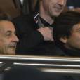 Nicolas Sarkozy avec Leonard, directeur sportif du PSG, au parc des Princes le 29 mars 2013