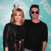 Demi Lovato et Simon Cowell, jurés de X Factor, présents à l'upfront Fox le 13 mai à New-York