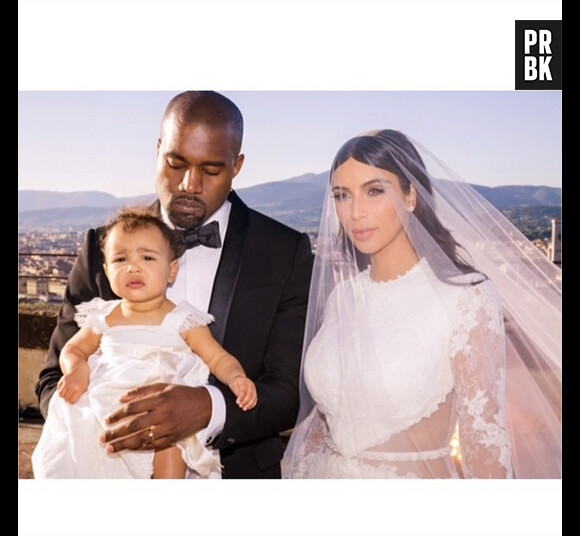 North West avec papa Kanye West et maman Kim Kardashian lors de leur mariage