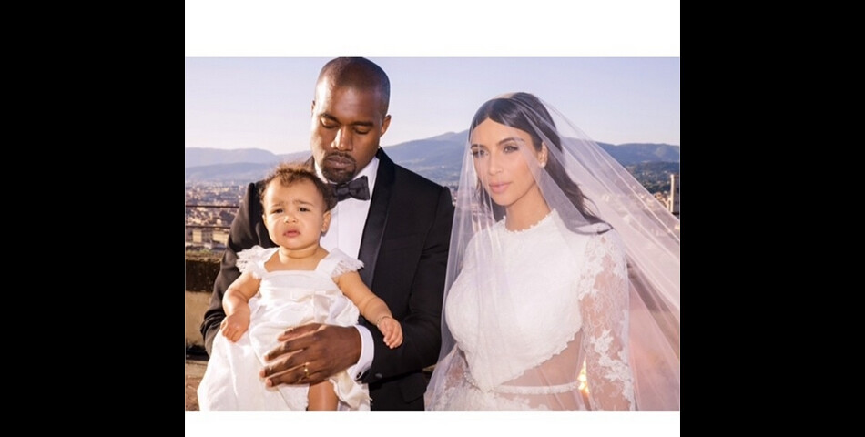 North West avec papa Kanye West et maman Kim Kardashian lors de leur mariage