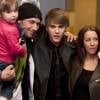 Justin Bieber entouré de ses parents à la projection de son documentaire Never Say Never en 2011