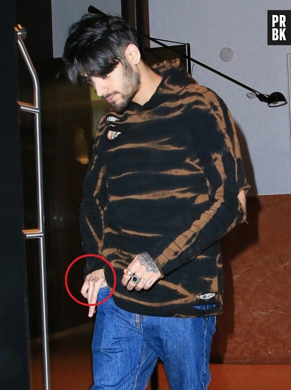Zayn Malik : un nouveau tatouage pour Gigi Hadid ? Il s'est fait tatouer "love" sur la main gauche.